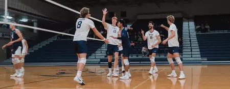 SPARTANS HOLD OFF MOUNT ROYAL TO EARN FOUR-SET WIN