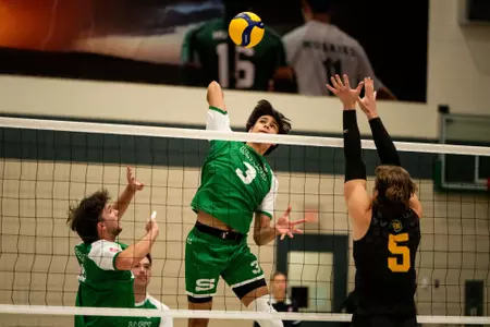 Huskies Fall Short in Season Opener as Golden Bears Prevail
in Four-Set Win
