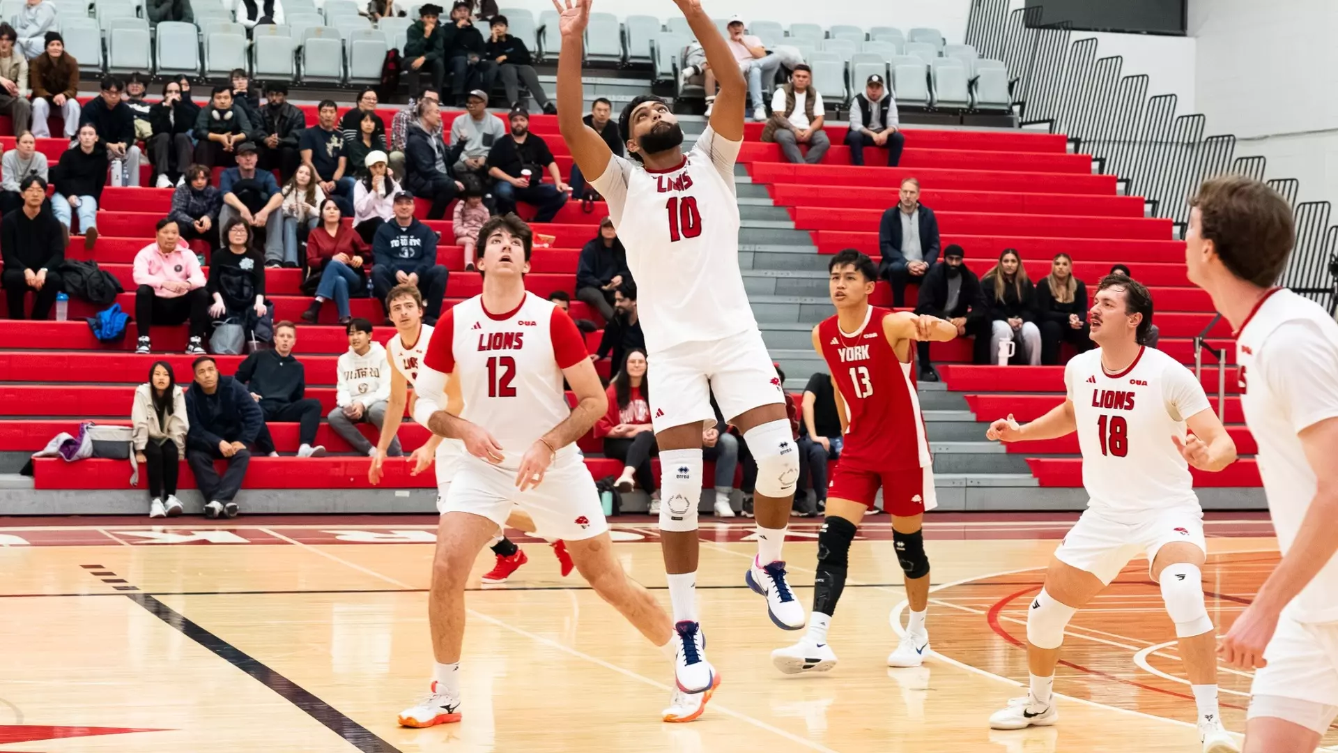 LIONS DROP FIVE-SET SATURDAY SHOWDOWN TO VARSITY
BLUES