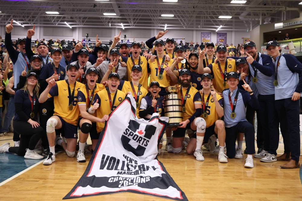 21032025
The Brandon Bobcats celebrate their 2025 U SPORTS Men's Volleyball Championship gold medal victory against University of Alberta Golden Bears at the Brandon University Healthy Living Centre on Sunday evening. The Bobcats defeated the Golden Bears in four sets. (Tim Smith/The Brandon Sun)