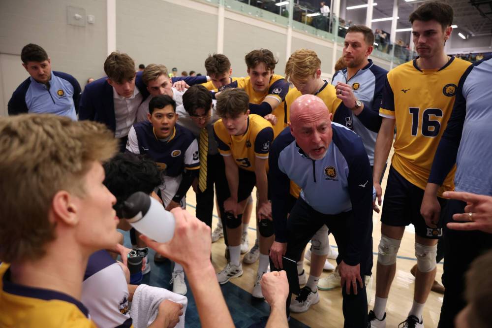 Brandon University Bobcats coach Grant Wilson talks to his players during one of the last timeouts of the season. (Tim Smith/The Brandon Sun)