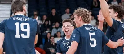 NO. 2 SPARTANS WIN BATTLE WITH HUSKIES