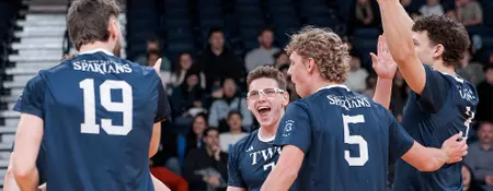 NO. 2 SPARTANS WIN BATTLE WITH HUSKIES