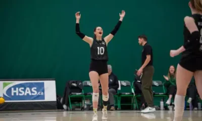 Huskies Clinch First Round Bye With Road Win Over
Cougars