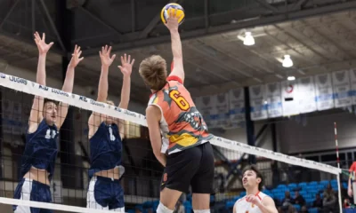 Dinos drop play-in opener to crosstown rival