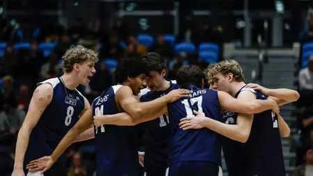 MVB: Dinos punch ticket to quarterfinals with victory over
Cougars