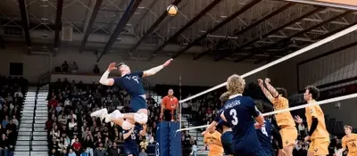SCHMIDT’S 28 KILLS LIFT SPARTANS PAST BISONS IN FIVE