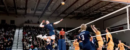 SCHMIDT’S 28 KILLS LIFT SPARTANS PAST BISONS IN FIVE